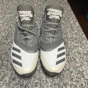 New, never worn Adidas baseball cleats.